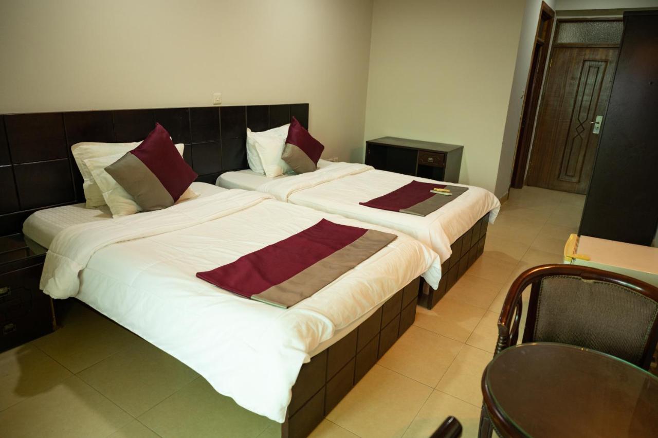Korkdam Hotel Taifa Buitenkant foto