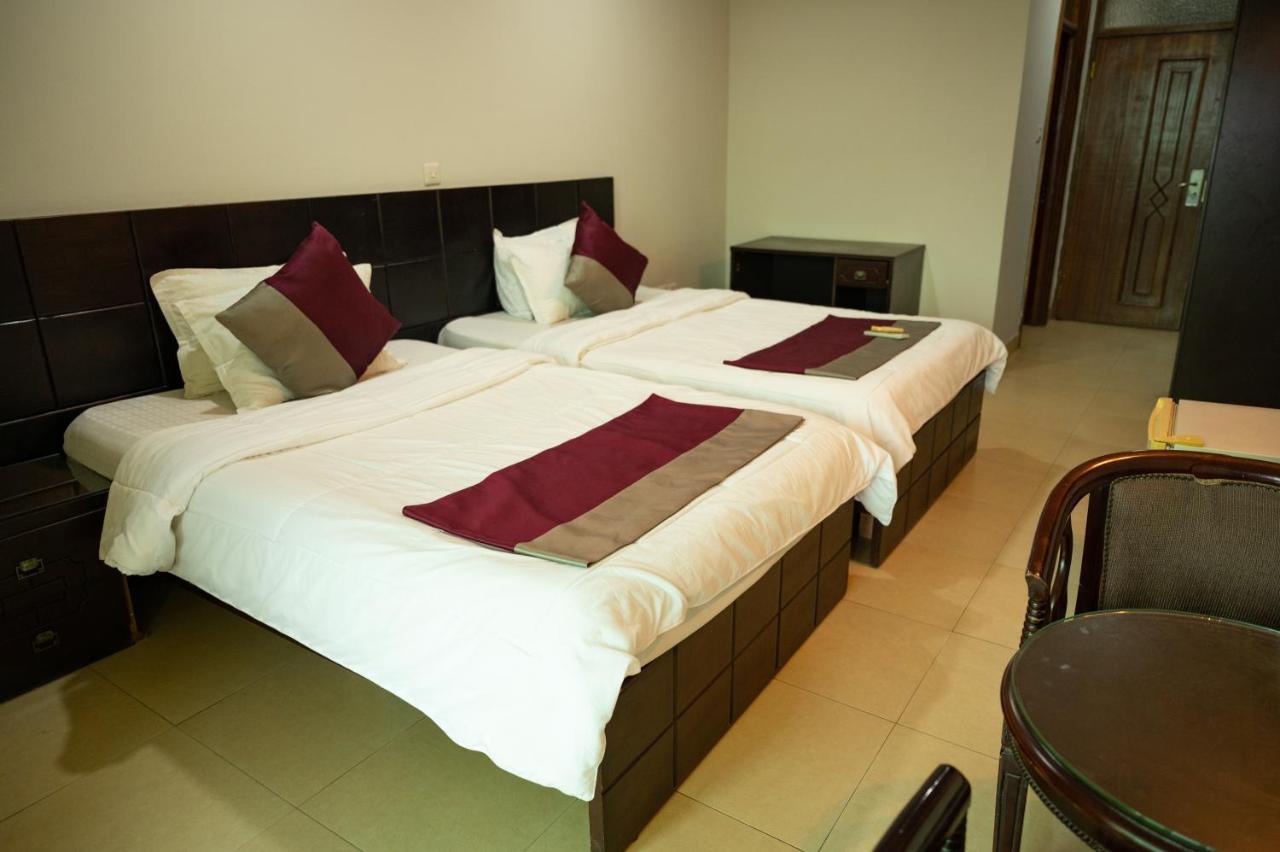 Korkdam Hotel Taifa Buitenkant foto
